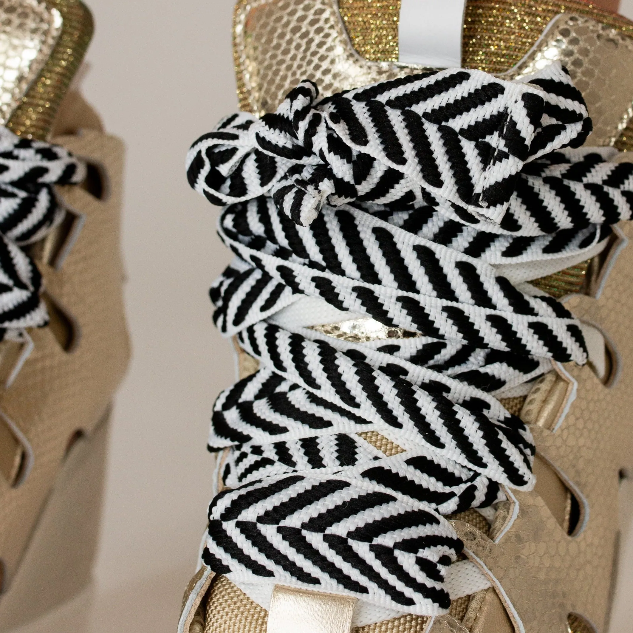 Courageous Gold Metallic Wedge Sneaker